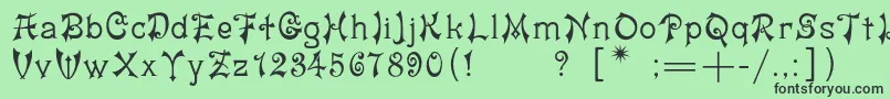 フォントYashmac – 緑の背景に黒い文字