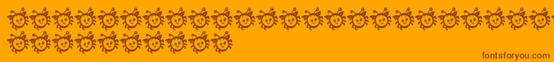 CuddlebugsBug-fontti – ruskeat fontit oranssilla taustalla