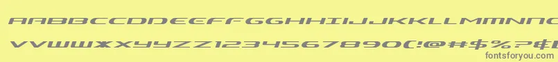 Alphamenexpandital-Schriftart – Graue Schriften auf gelbem Hintergrund