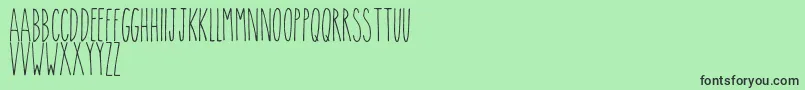 Theskinny Font – Black Fonts on Green Background