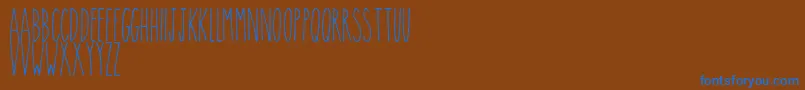 Theskinny Font – Blue Fonts on Brown Background