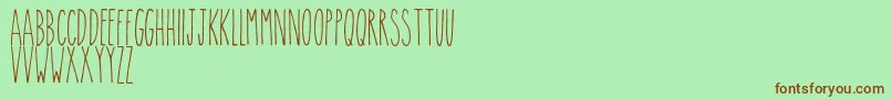 Theskinny Font – Brown Fonts on Green Background