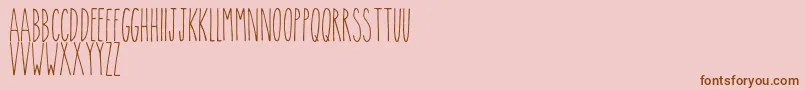 Theskinny Font – Brown Fonts on Pink Background