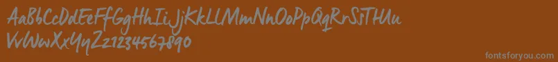 ManusSmoothTrial Font – Gray Fonts on Brown Background