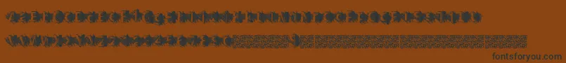 Zombiescratch-Schriftart – Schwarze Schriften auf braunem Hintergrund