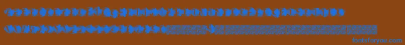 フォントZombiescratch – 茶色の背景に青い文字