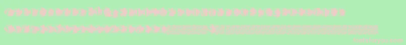 Zombiescratch-fontti – vaaleanpunaiset fontit vihreällä taustalla
