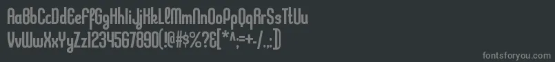 Fonte KleptocracycdRegular – fontes cinzas em um fundo preto