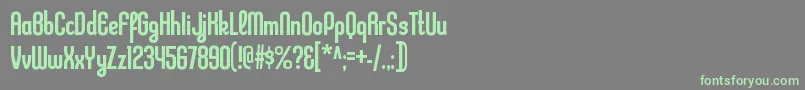 フォントKleptocracycdRegular – 灰色の背景に緑のフォント