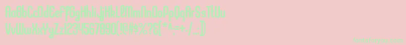 KleptocracycdRegular Font – Green Fonts on Pink Background