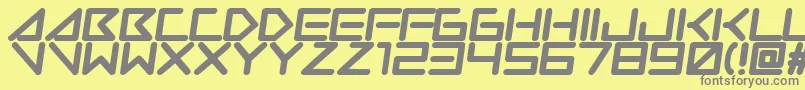 フォントInsanehours – 黄色の背景に灰色の文字