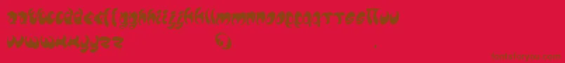 フォントLomax – 赤い背景に茶色の文字