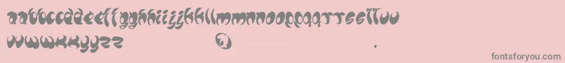 Lomax-fontti – harmaat kirjasimet vaaleanpunaisella taustalla