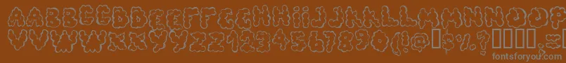 Defecafont Font – Gray Fonts on Brown Background