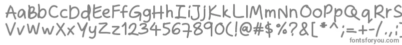 フォントZakirahshandb – 白い背景に灰色の文字