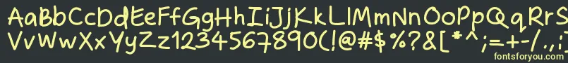 Zakirahshandb Font – Yellow Fonts on Black Background