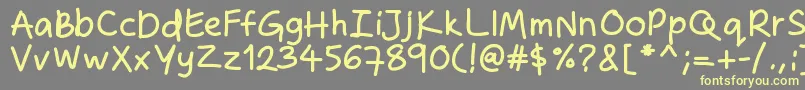 Zakirahshandb Font – Yellow Fonts on Gray Background