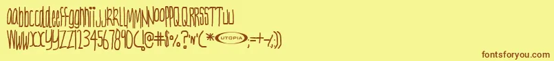 フォントNervt ffy – 茶色の文字が黄色の背景にあります。