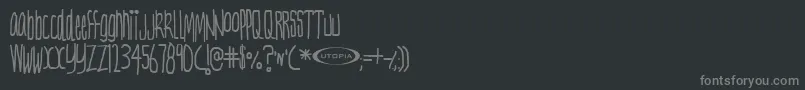 フォントNervt ffy – 黒い背景に灰色の文字