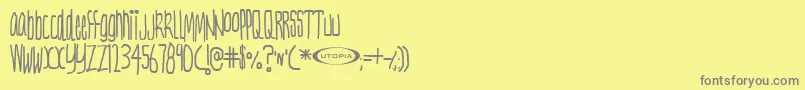 フォントNervt ffy – 黄色の背景に灰色の文字