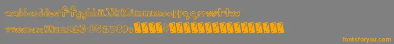 フォントSanscollege – オレンジの文字は灰色の背景にあります。