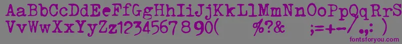 TriumphTippa-fontti – violetit fontit harmaalla taustalla