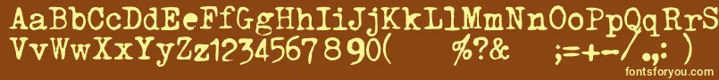 TriumphTippa-fontti – keltaiset fontit ruskealla taustalla