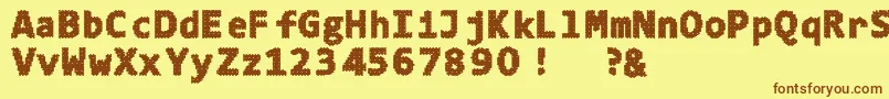 フォント4ka – 茶色の文字が黄色の背景にあります。