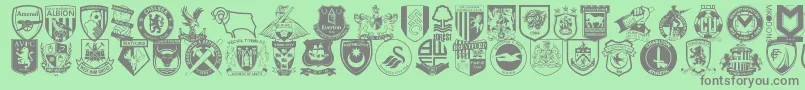 Fonte Englishfootballclubbadges – fontes cinzas em um fundo verde