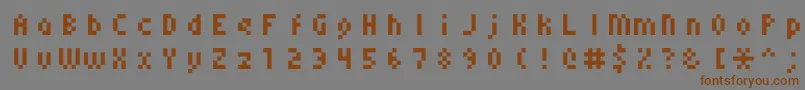 Monoeger0556-fontti – ruskeat fontit harmaalla taustalla