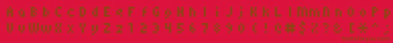 Monoeger0556-Schriftart – Braune Schriften auf rotem Hintergrund