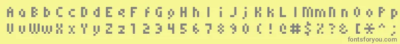 Czcionka Monoeger0556 – szare czcionki na żółtym tle