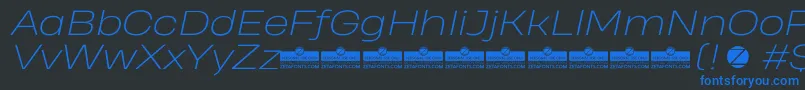 HeadingProWideExtralightItalicTrial Font – Blue Fonts on Black Background