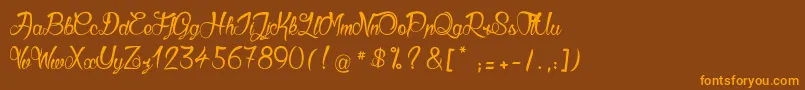 Weitere Informationen zur GueulesDeLoup2-Schriftart GueulesDeLoup2-Schriftart – Orangefarbene Schriften auf braunem Hintergrund