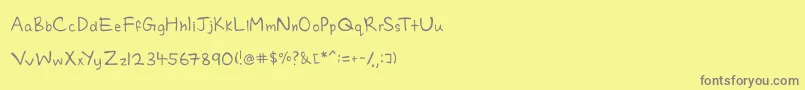 More about Charmie Font Charmie Font – Gray Fonts on Yellow Background