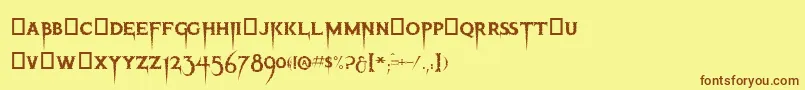 フォントThriller – 茶色の文字が黄色の背景にあります。