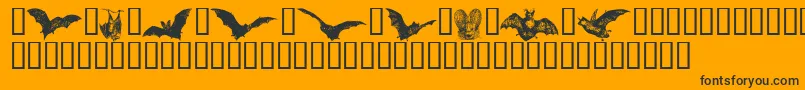 Batbats-Schriftart – Schwarze Schriften auf orangefarbenem Hintergrund