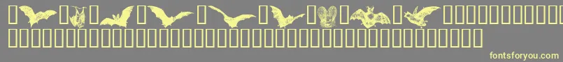 Batbats Font – Yellow Fonts on Gray Background