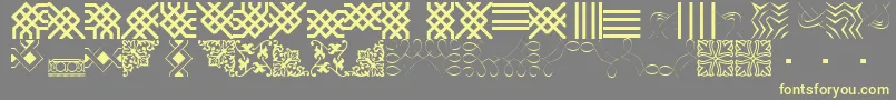 BorderbatsFilligree Font – Yellow Fonts on Gray Background