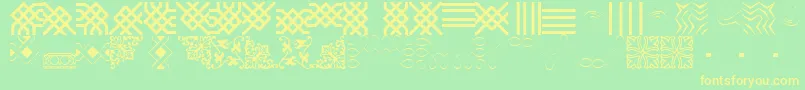 フォントBorderbatsFilligree – 黄色の文字が緑の背景にあります