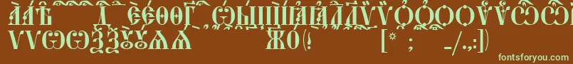 フォントStarouspenskayaCapsKucs – 緑色の文字が茶色の背景にあります。