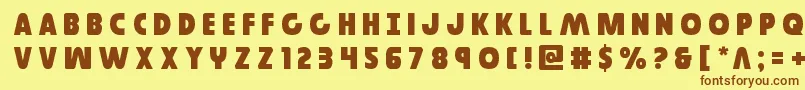 フォントGovernortitle – 茶色の文字が黄色の背景にあります。