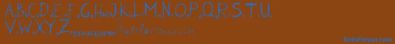 KarenErc2006 Font – Blue Fonts on Brown Background