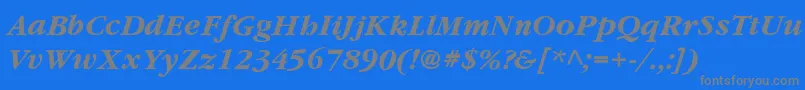 YearlindThinItalic-Schriftart – Graue Schriften auf blauem Hintergrund
