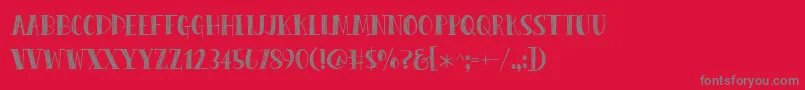 Fonte PeasCarrots – fontes cinzas em um fundo vermelho