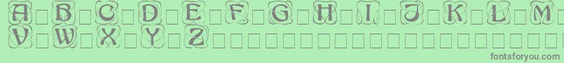 AdageDisplayCapsSsi Font – Gray Fonts on Green Background