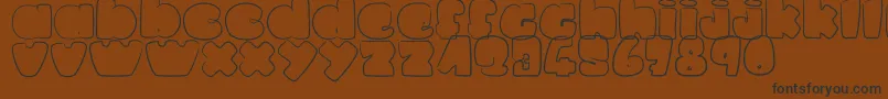 LaPetitePuce Font – Black Fonts on Brown Background