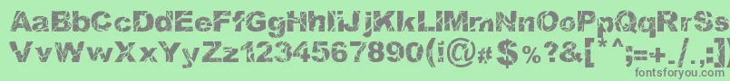 WoodcutterStorm Font – Gray Fonts on Green Background