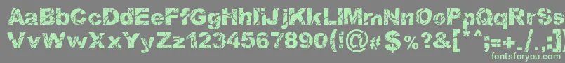 WoodcutterStorm Font – Green Fonts on Gray Background