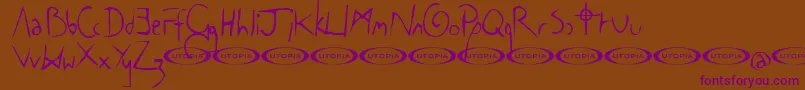 TheCowboyFont-Schriftart – Violette Schriften auf braunem Hintergrund